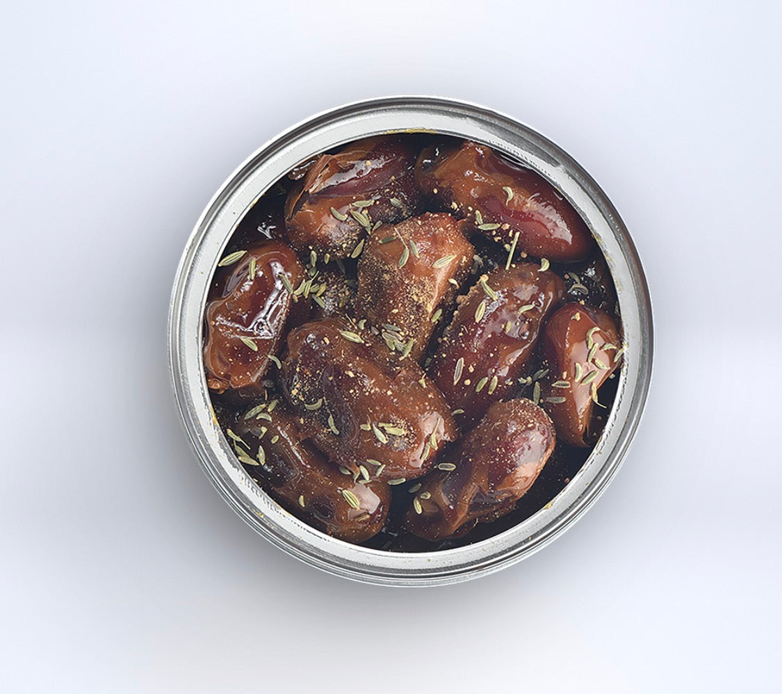 علب معدنية تمر خلاص بالزنجبيل والحلوة منزوع النوى